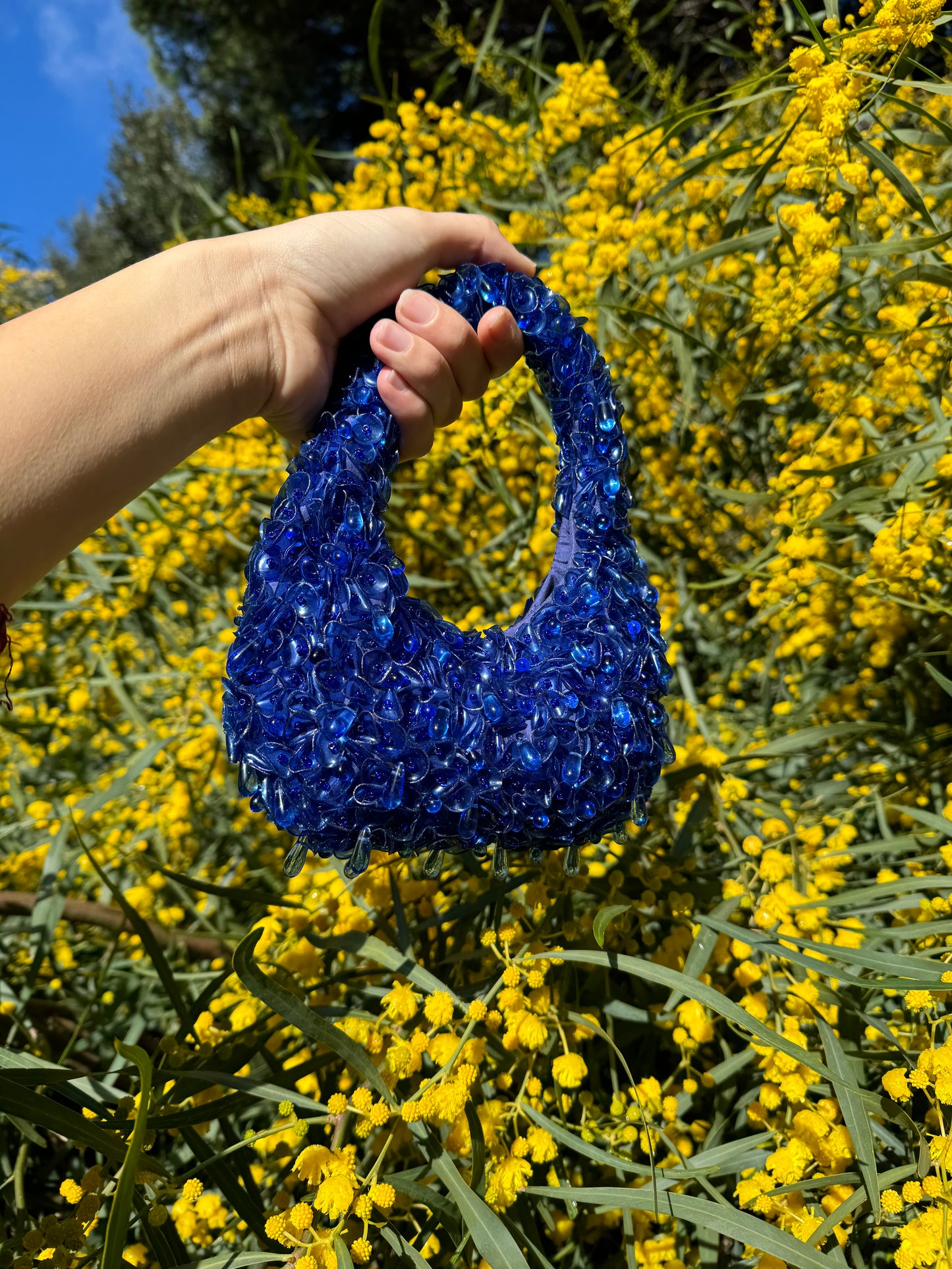 Blue plastic bottle bag