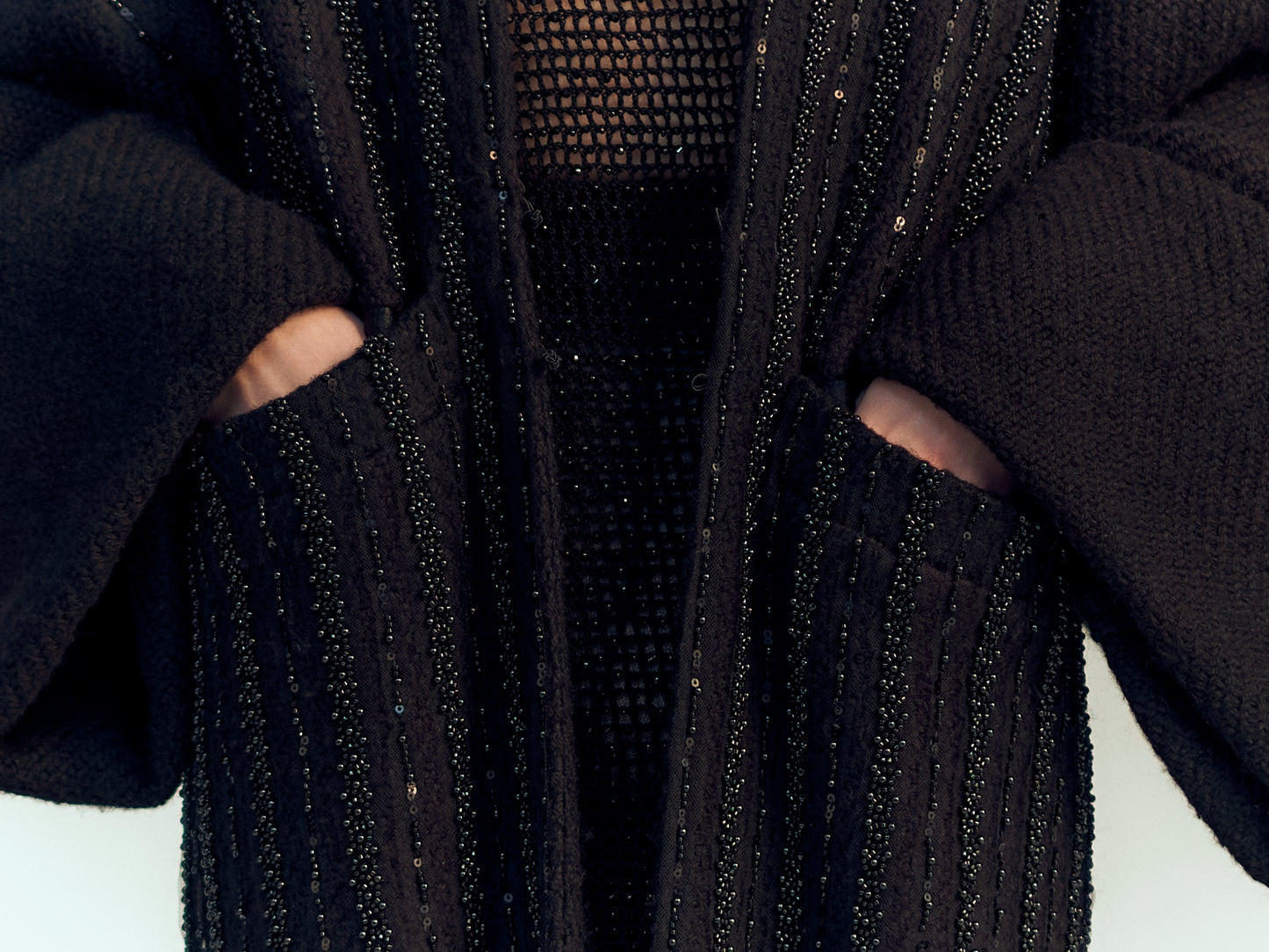 Black beaded wool coat