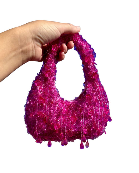 The pink plastic bottle bag